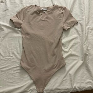 One Piece in Beige aritzia